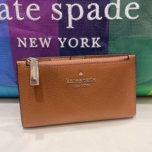 Kate Spade leila small slim bifold wallet
WARM GINGERBREAD